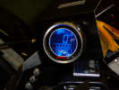 Koso digital fuel gauge and speedo reading half full.