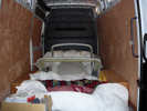 A carefully loaded van.  There's a bodyshell under all the blankets and duvets... promise!